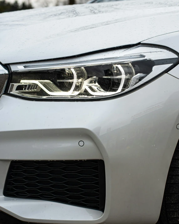 the front of a white bmw car