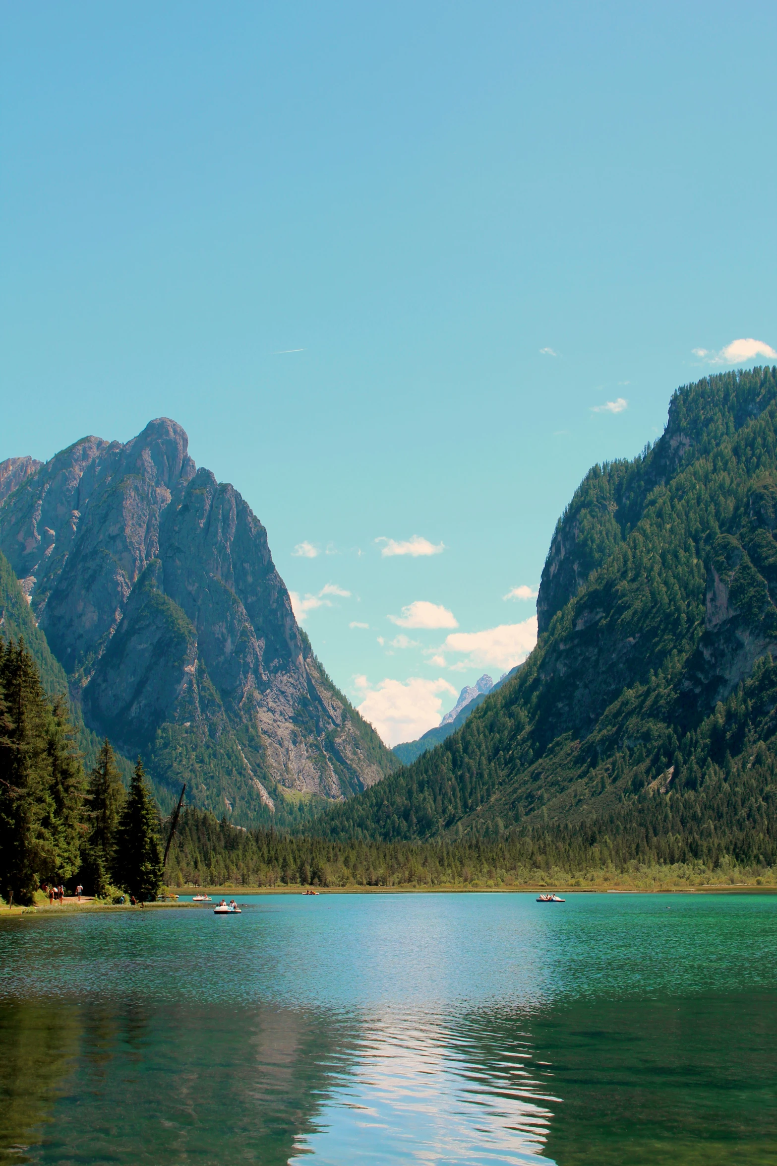 a mountain range rising above a body of water