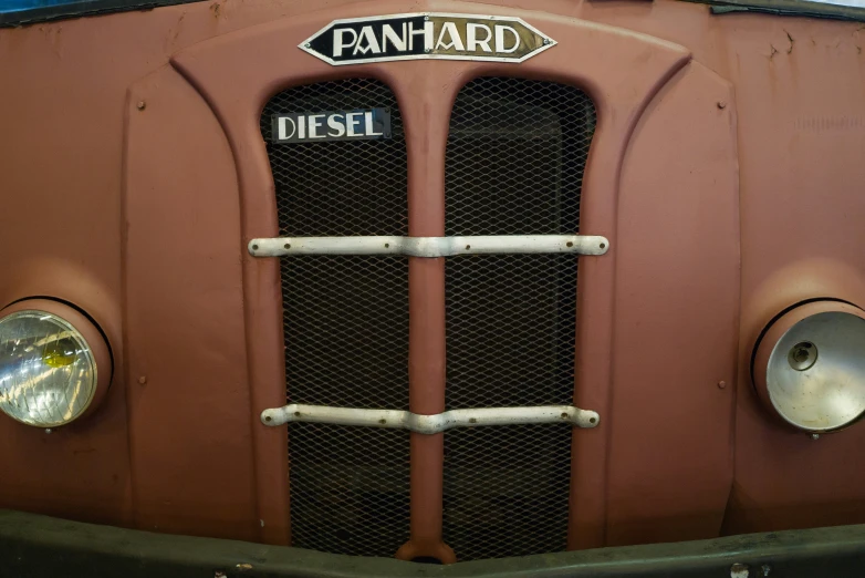 the front grille of a very old classic truck