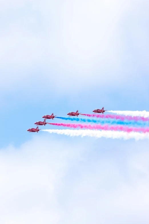 the jets are taking off into a beautiful sky