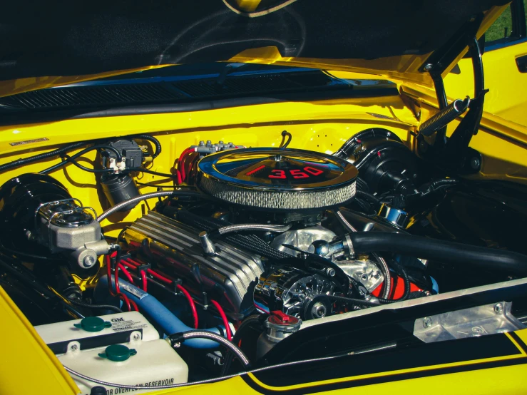 the engine of a race car with the hood open