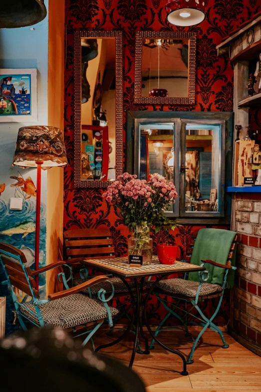 red room with several chairs and various objects