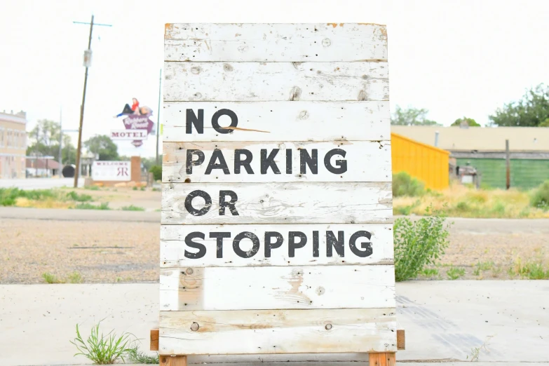 there is a sign that warns that no parking or stopping is allowed