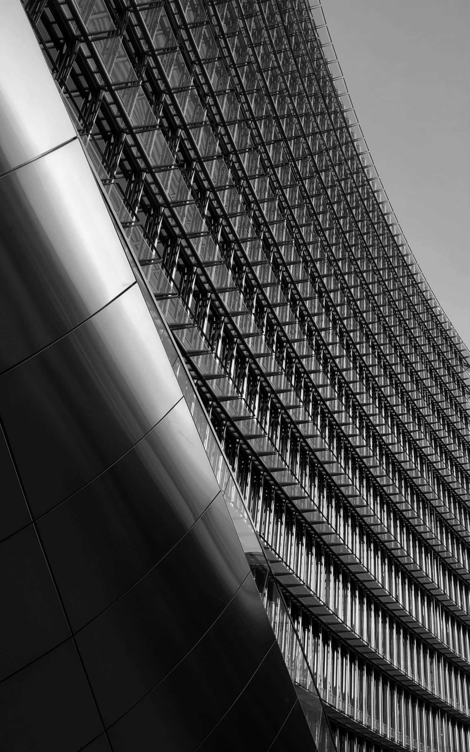 an abstract po of a large metal structure in black and white