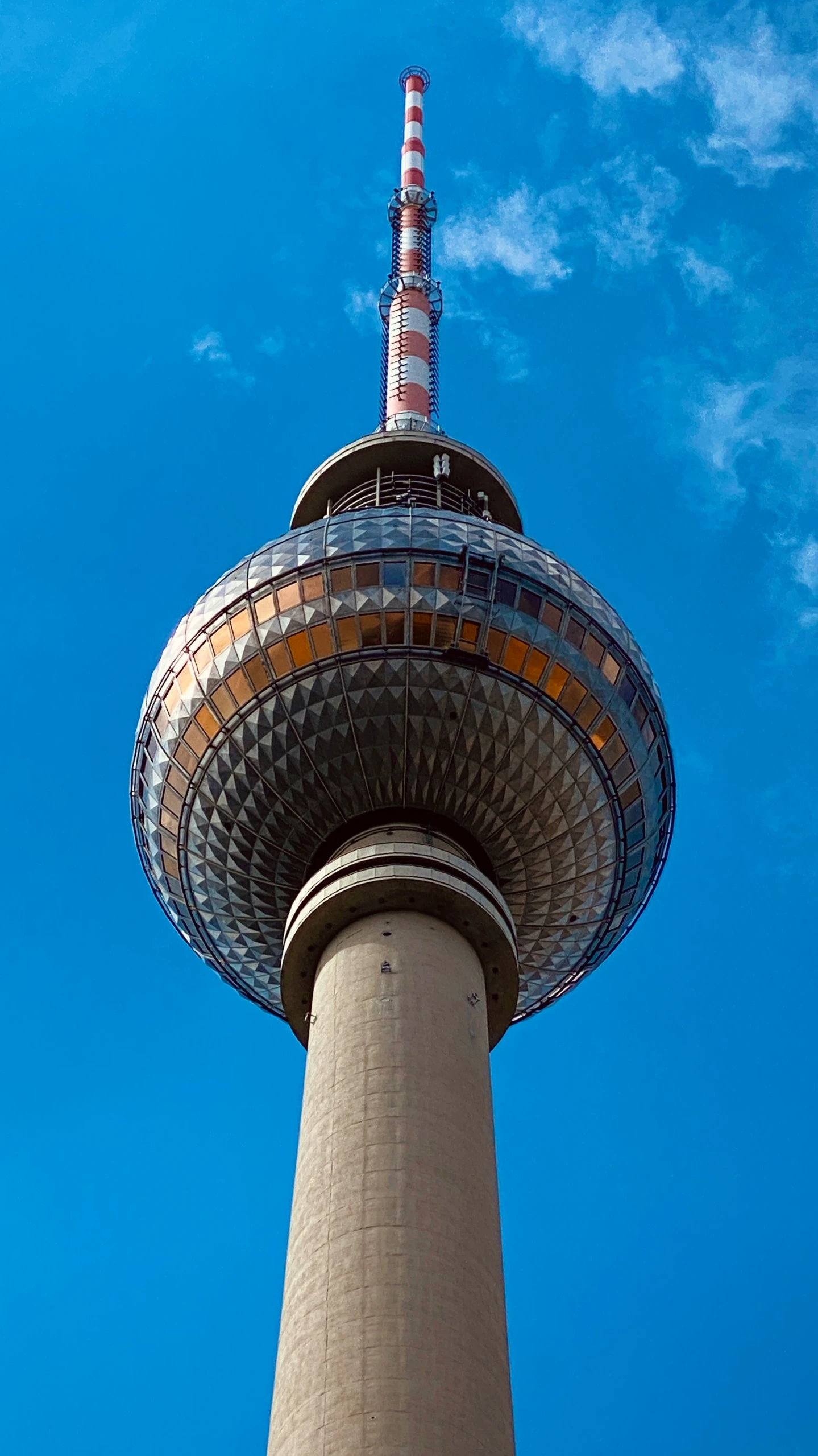 a tall tower is shown under a blue sky