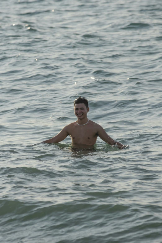 man with  swimming in the ocean