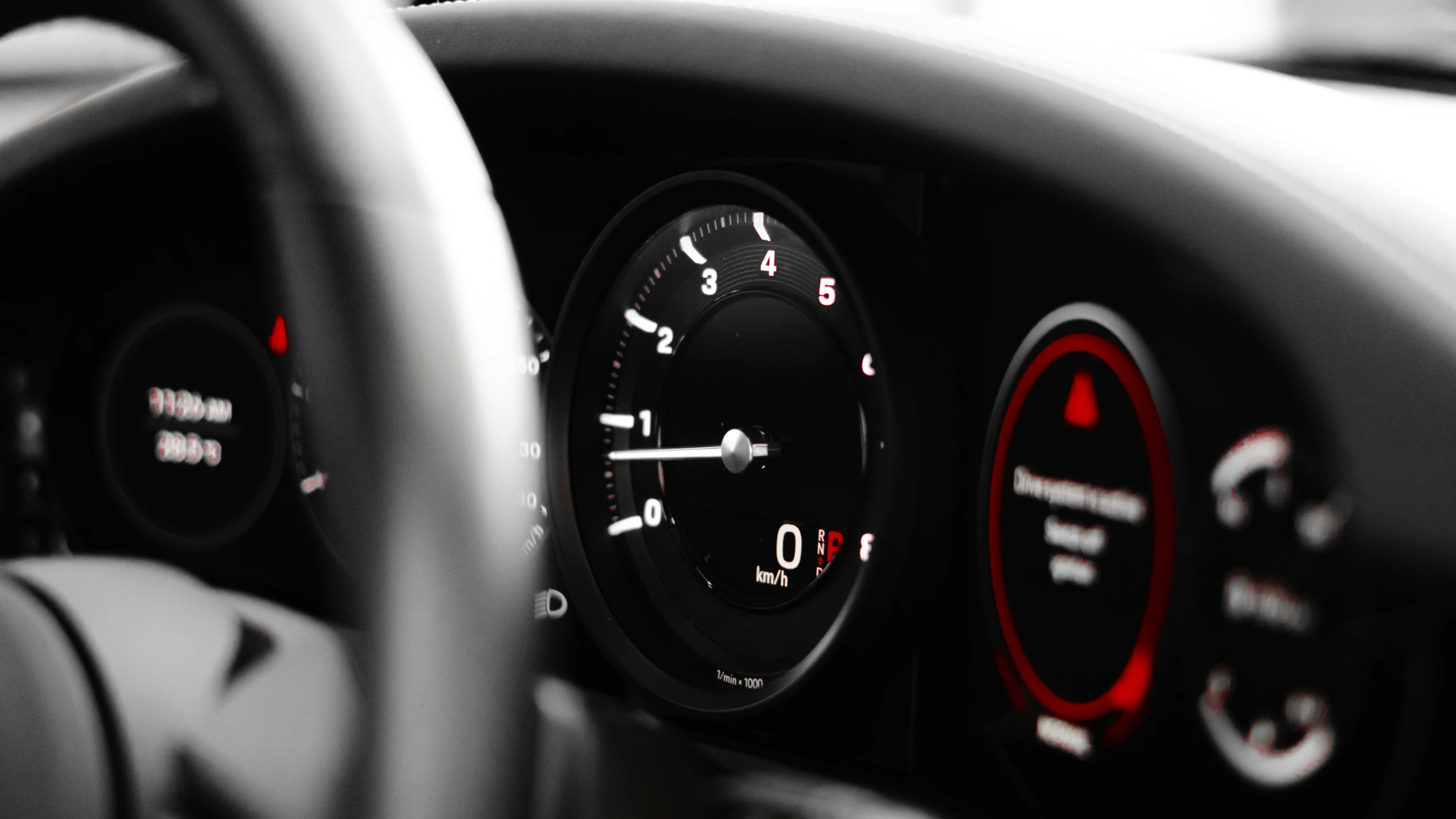 a car dashboard with the clock showing