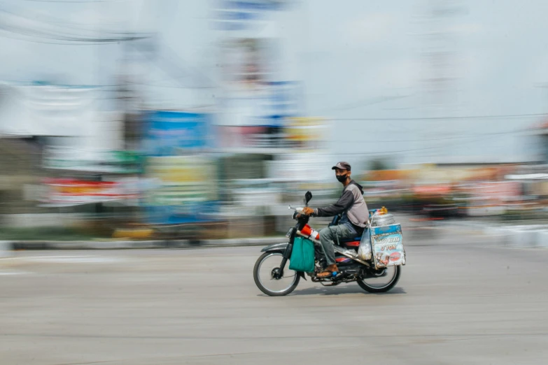 a person on a motorcycle with a side car