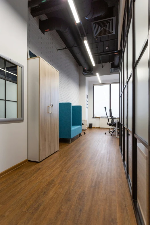 the empty room with wooden floors is clean