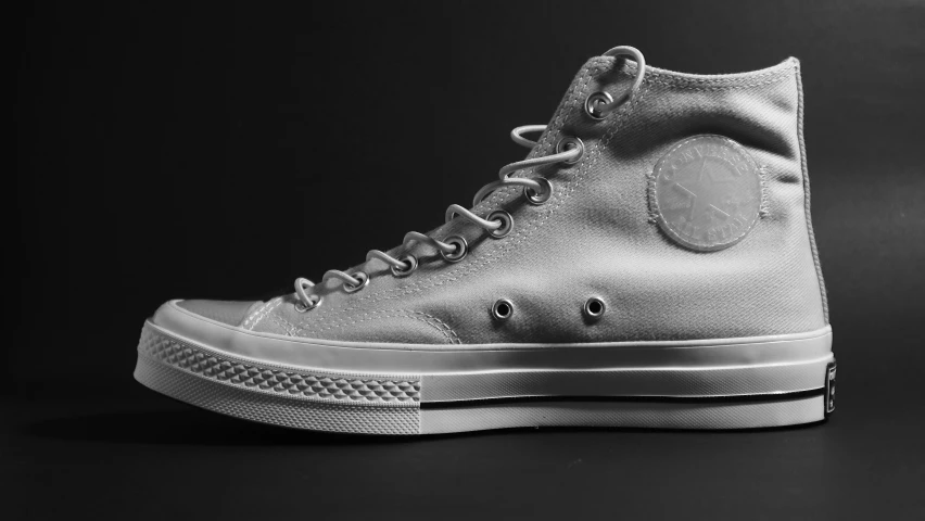 black and white pograph of an all star converse