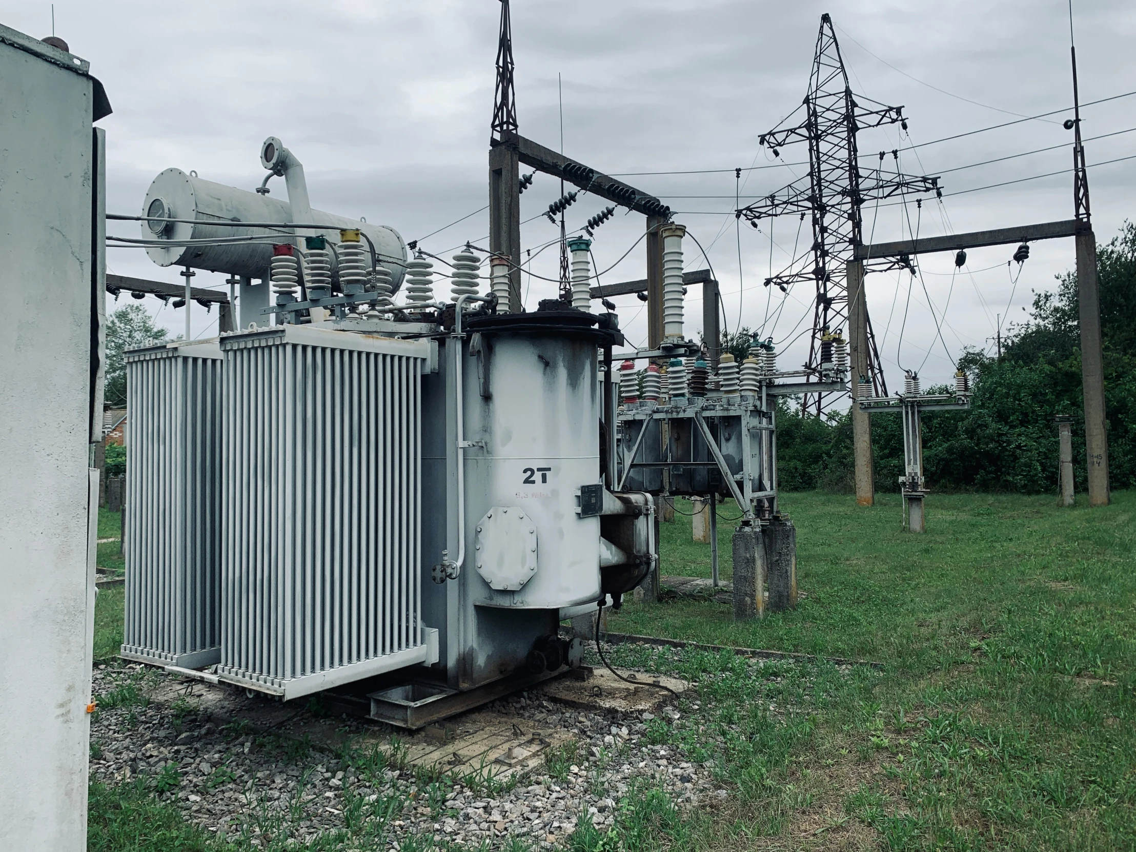 electrical lines and substation meters on an overcast day