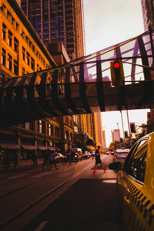 an empty street in an urban area with a pedestrian crossing