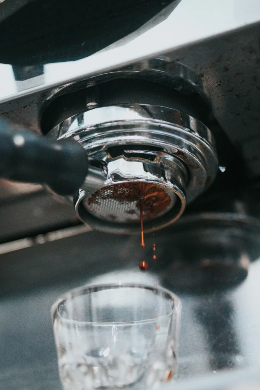 the glass is being filled with liquid