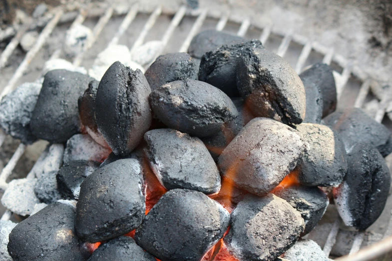 the coal balls are being cooked over an open fire