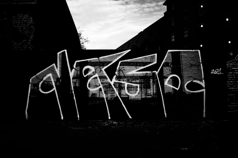 an image of graffiti written on a building