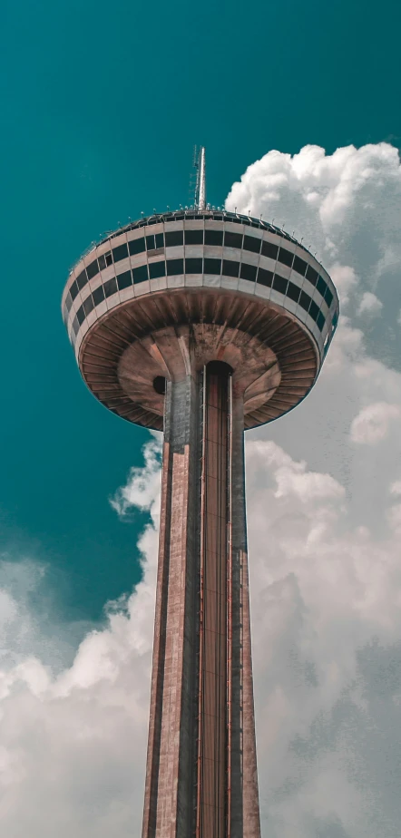 the top of a building with a sky in the background