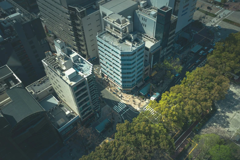 an aerial view of many skyscrs in the city