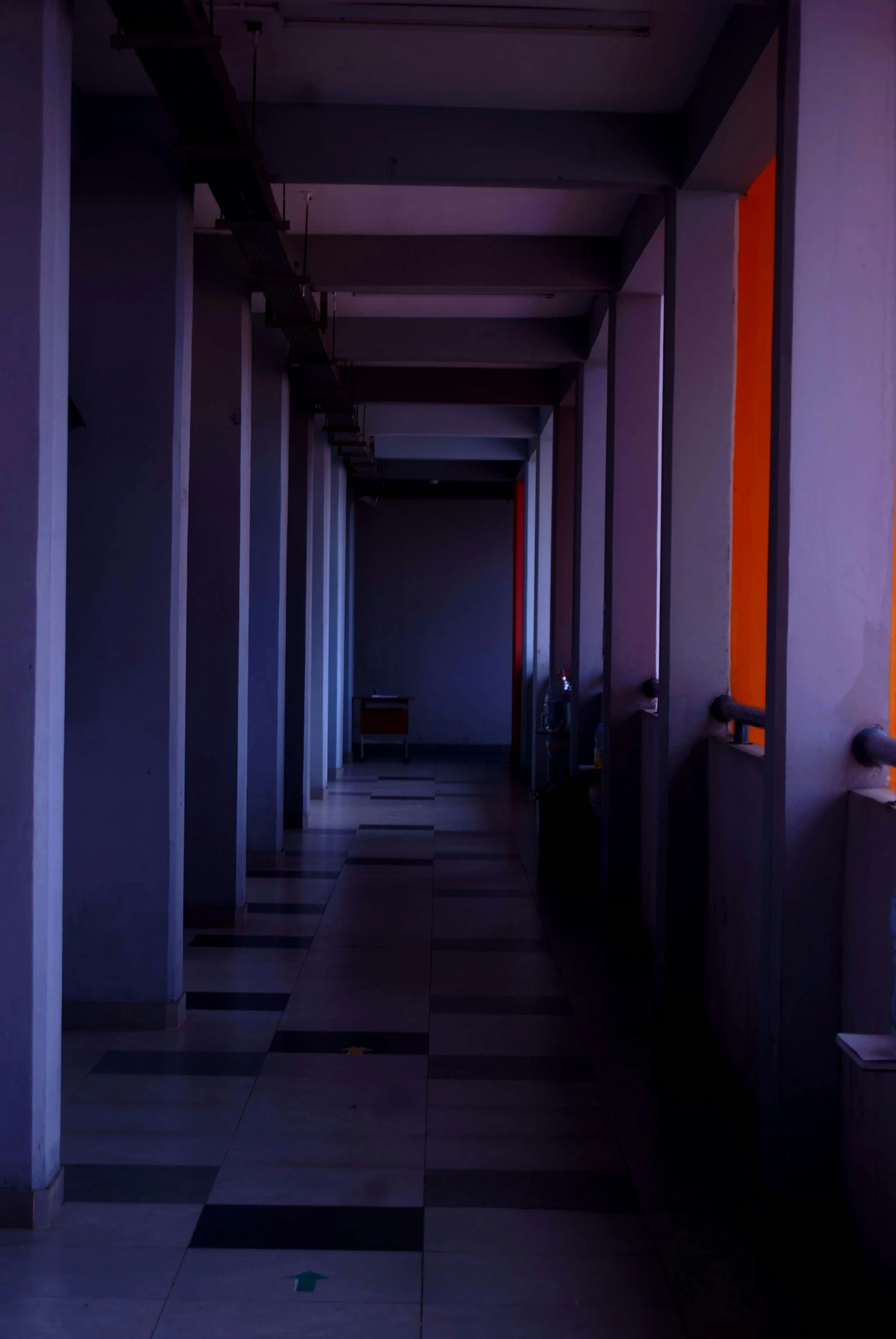 this hallway is brightly colored and looks like a dark one