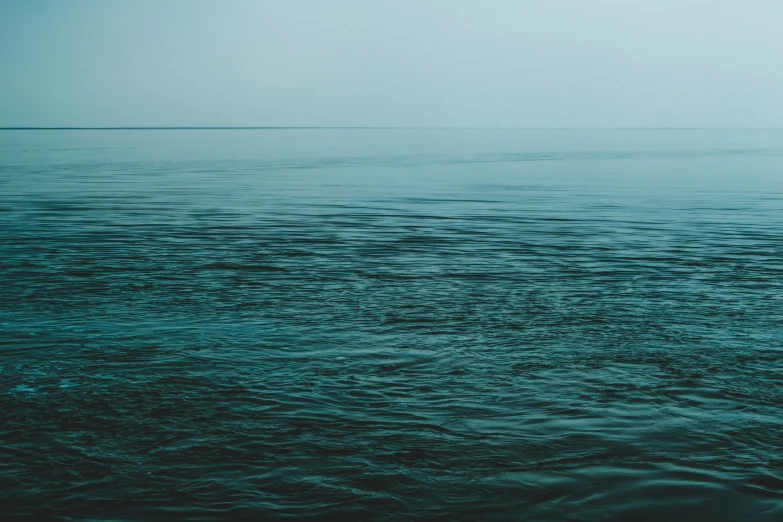 blue ocean with small waves in the water