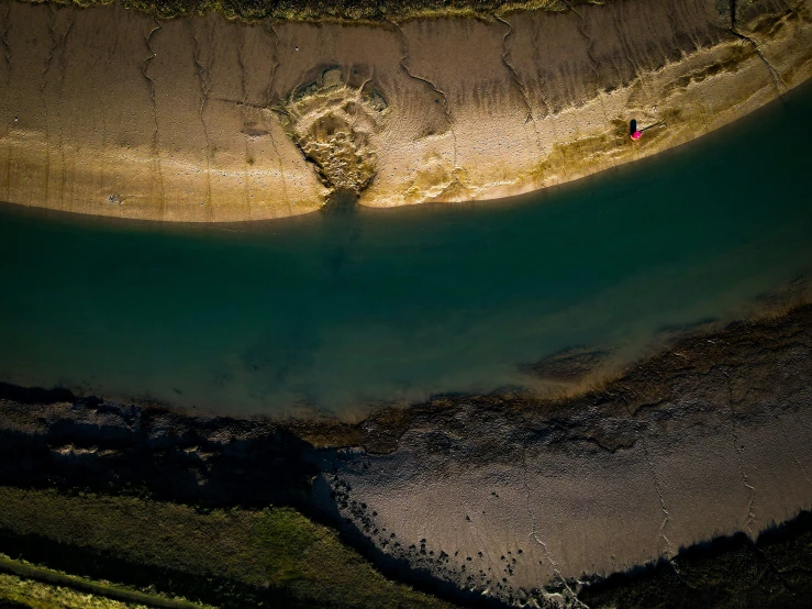 a picture of a body of water and land