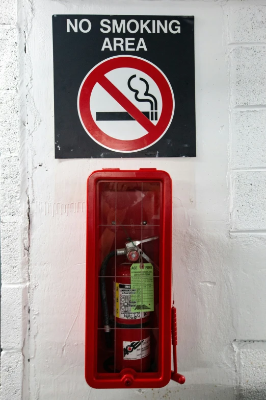 there is a no smoking sign and a red box