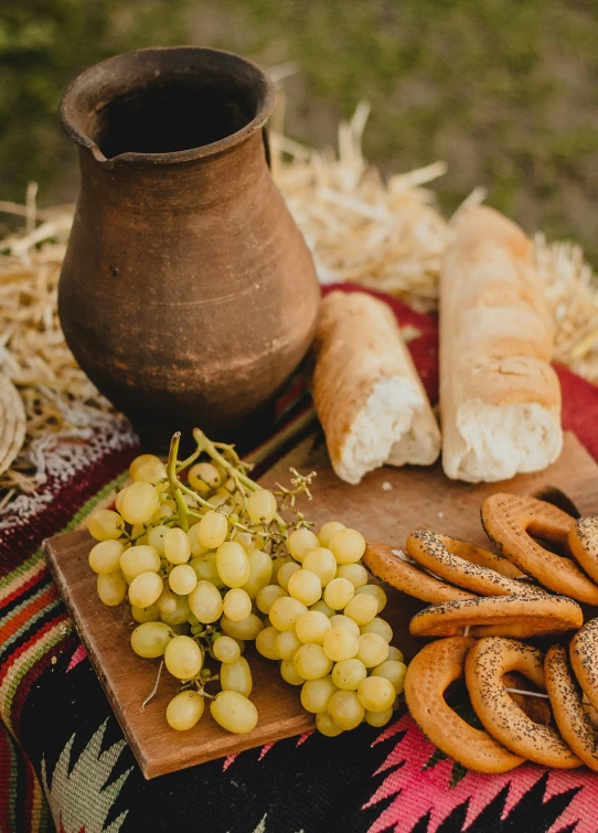 a table with bread, gs and other items