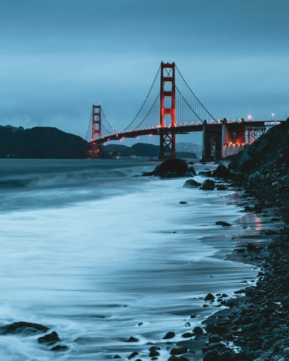 the golden gate bridge in san francisco is lit up