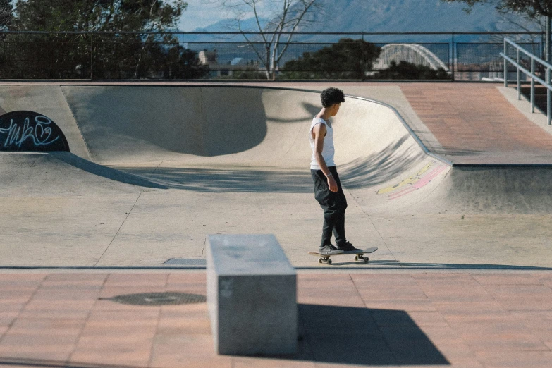 a person riding on a skate board at a skate park