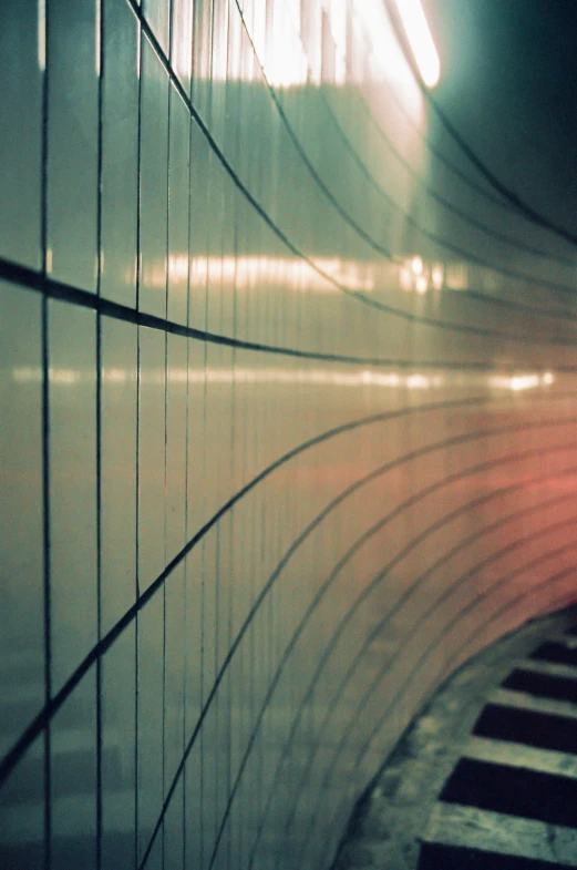 a person that is walking across a bridge