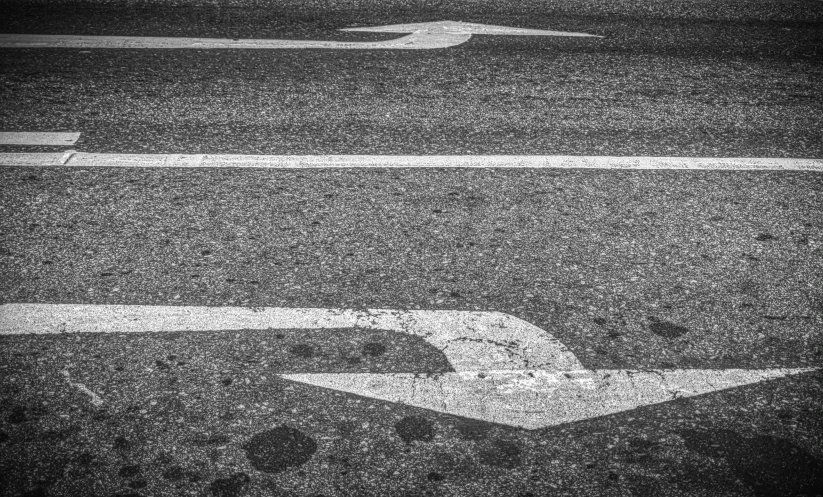 the black and white aerial view of a city street