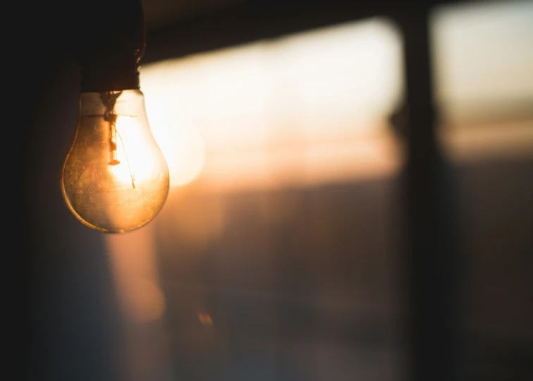 close up image of a light bulb that is partially turned on