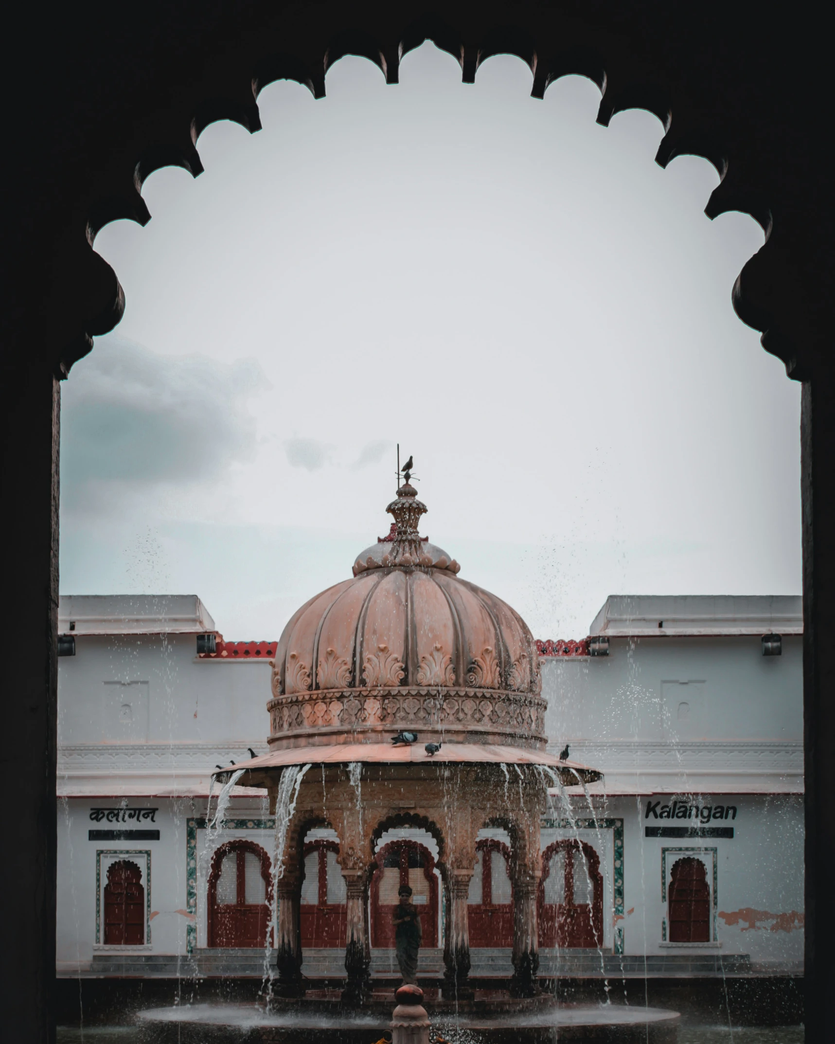 there is a gazebo in front of a building