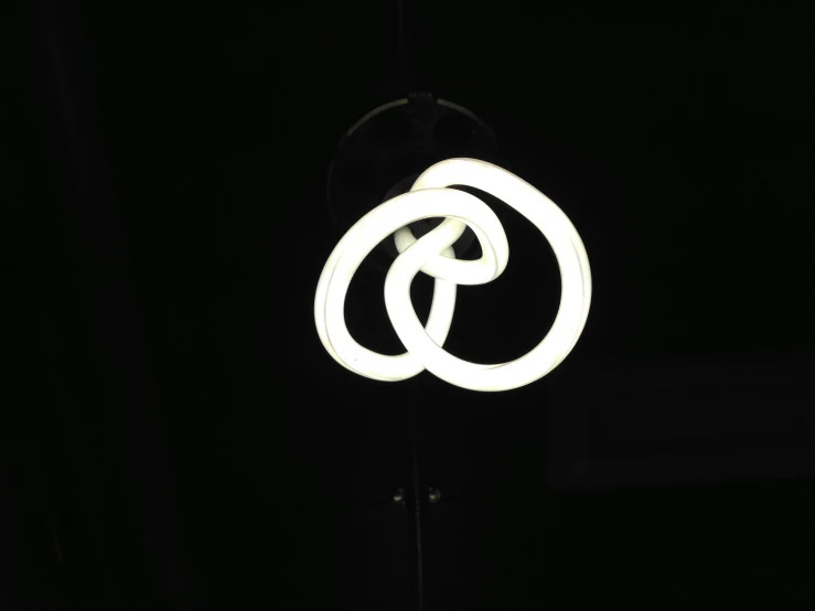 a light bulb with a logo next to it