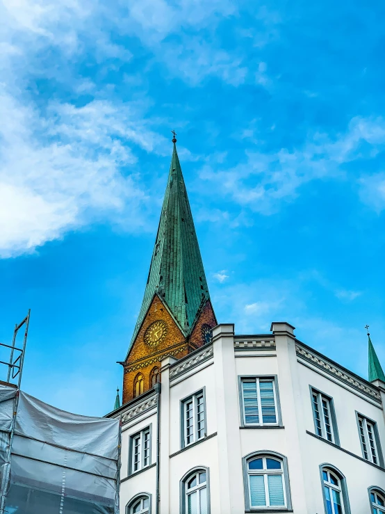 the building has a dome with an elaborate golden decoration