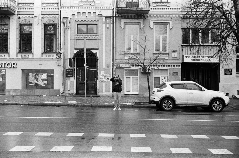 a car is parked in front of a building