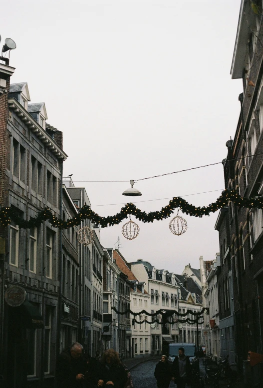 an old fashioned street with several buildings