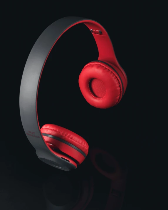 two headphones side by side on a dark background