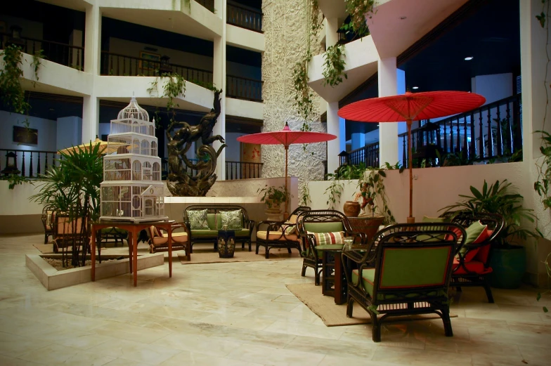 an outdoor area with lots of tables and chairs