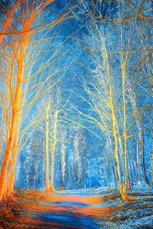 blue tree painting in blue hues to represent winter
