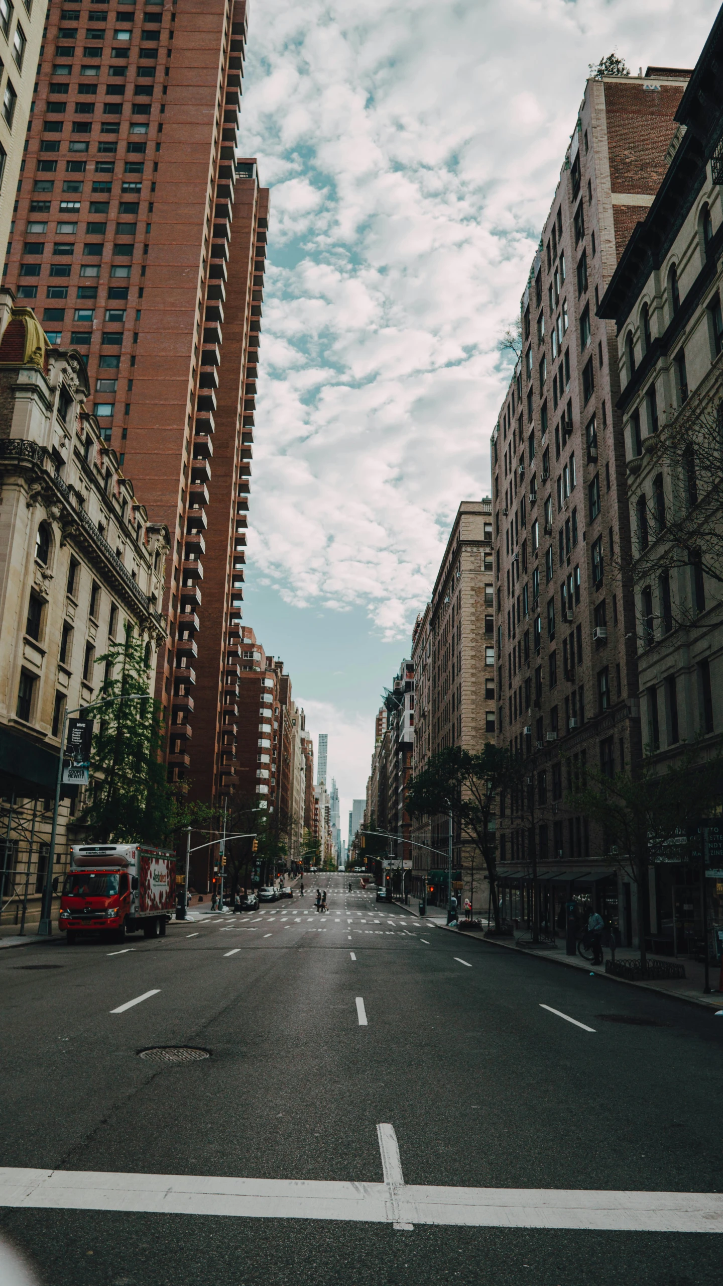 an empty street in the middle of a city