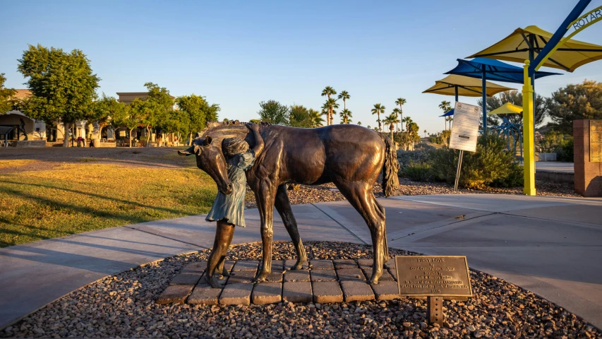 the statue is of an elephant standing alone