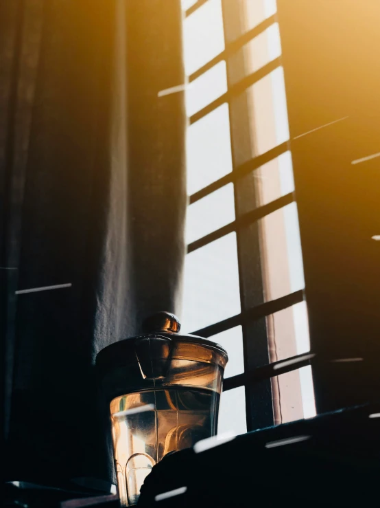 a close - up of a glass on a window sill