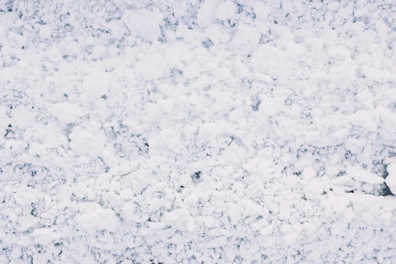 a background image of snow with white patches