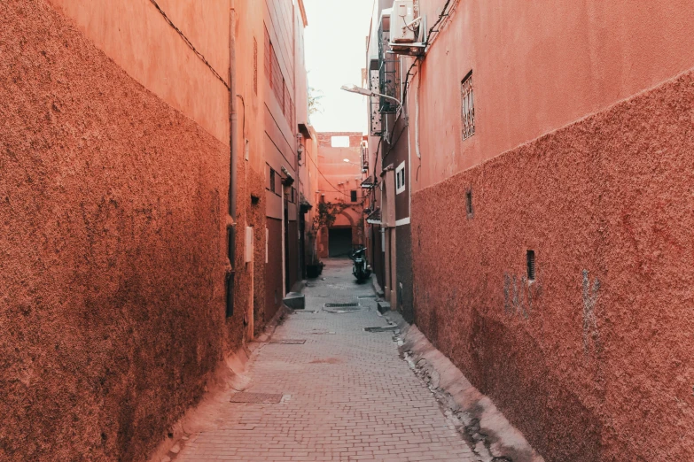 an alleyway with several buildings on either side