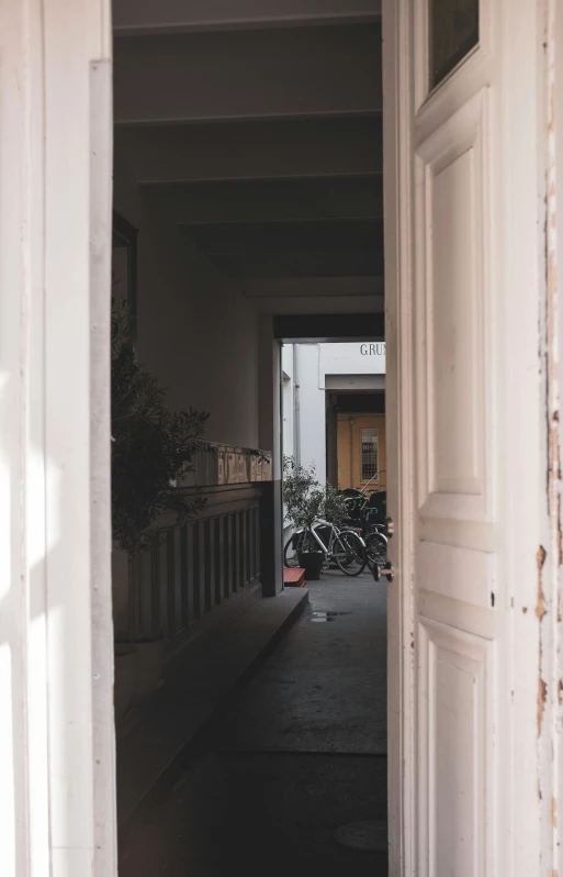 some bikes parked behind a fence in a building