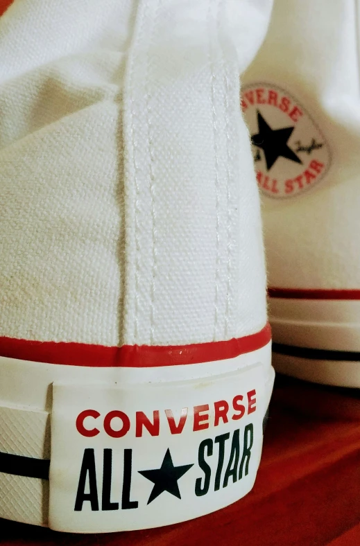 converse all star shoes with white canvas and black toecaps