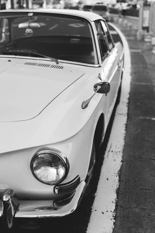 black and white po of an old car