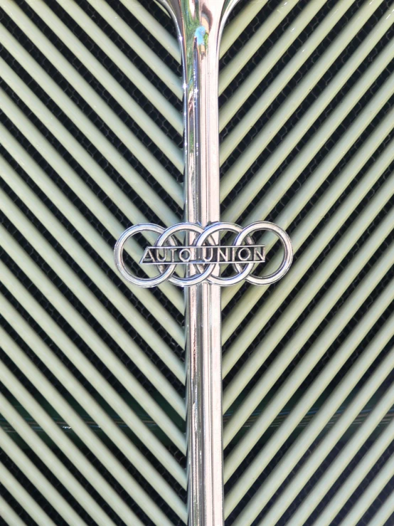 a logo of an automobile company is shown on a wall