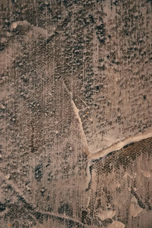 some sand and some rocks in a field