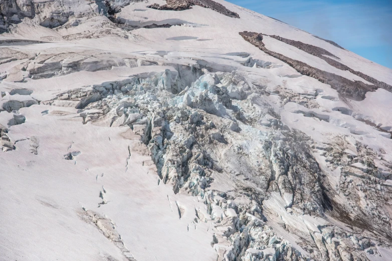 an aerial view shows many boulders in the mountains